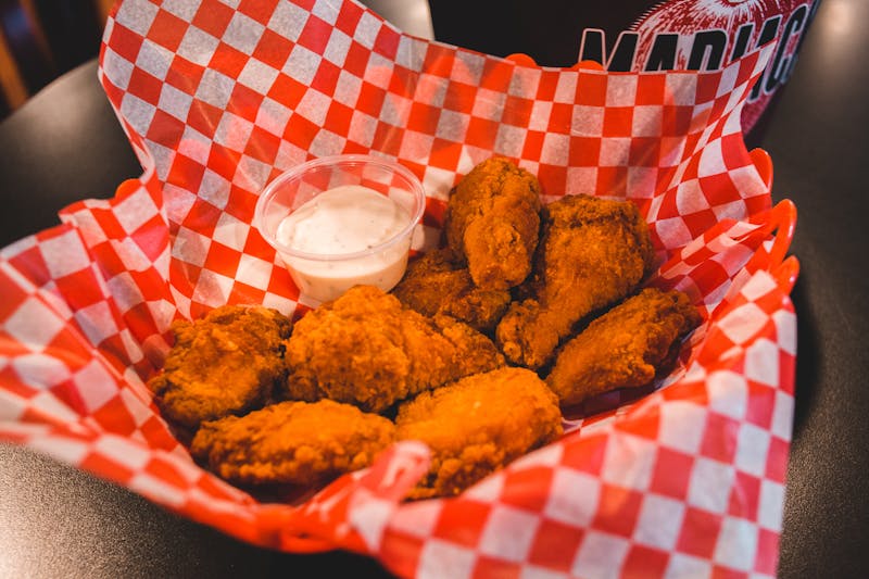 Starbird chicken and sides spread on a table